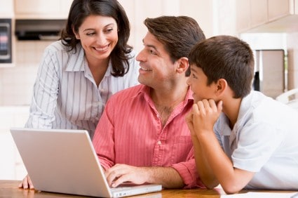 Portrait of Family with laptop 