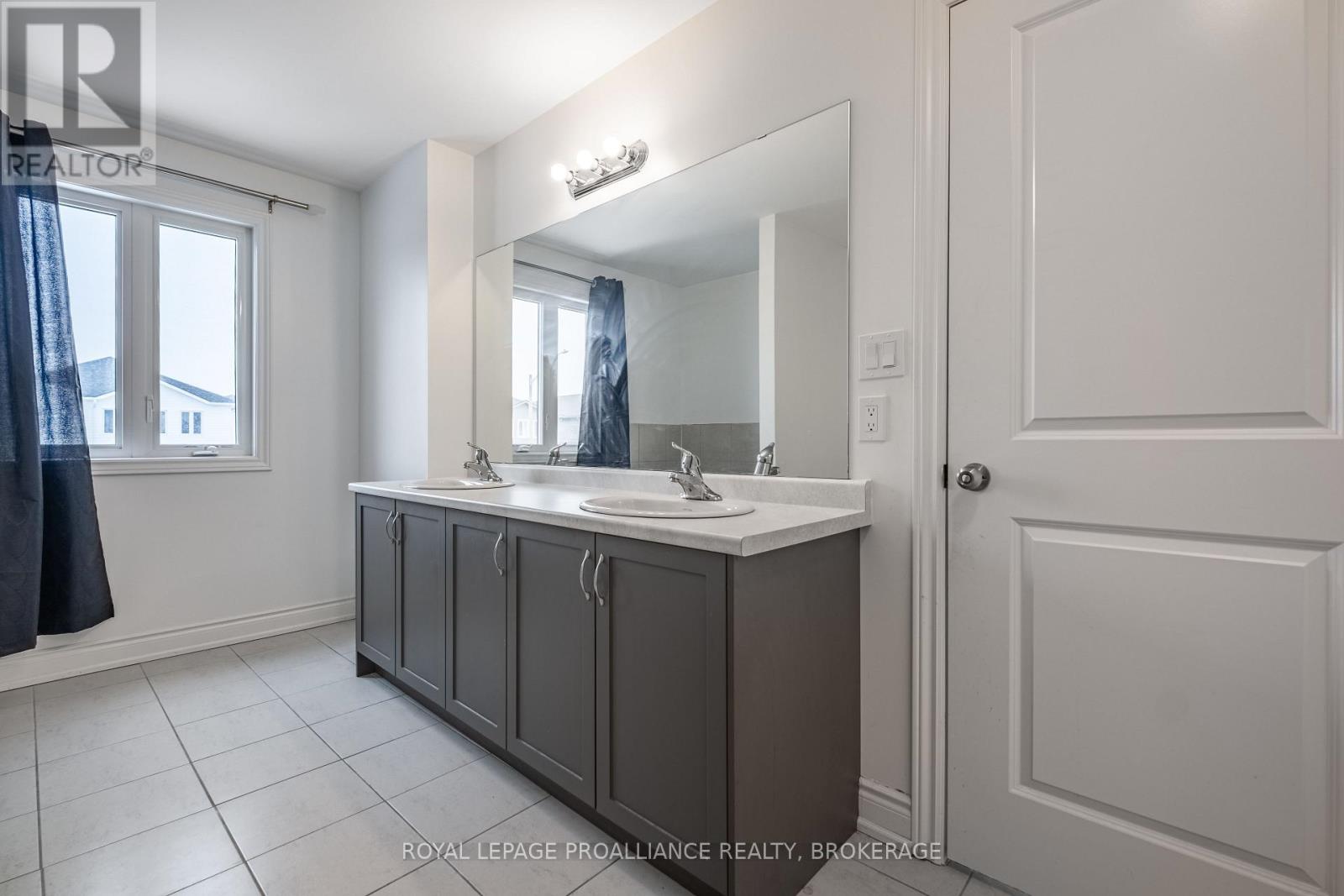 18 Millcreek Drive, Loyalist, Ontario  K0H 2H0 - Photo 22 - X12003764