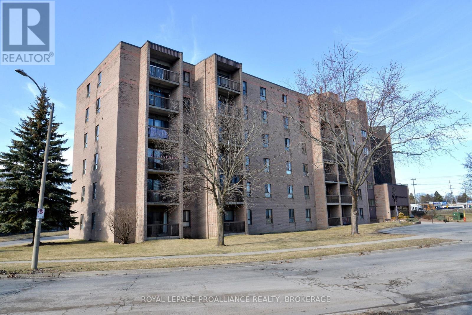 210 - 17 Eldon Hall Place, Kingston, Ontario  K7M 7H5 - Photo 1 - X12054526