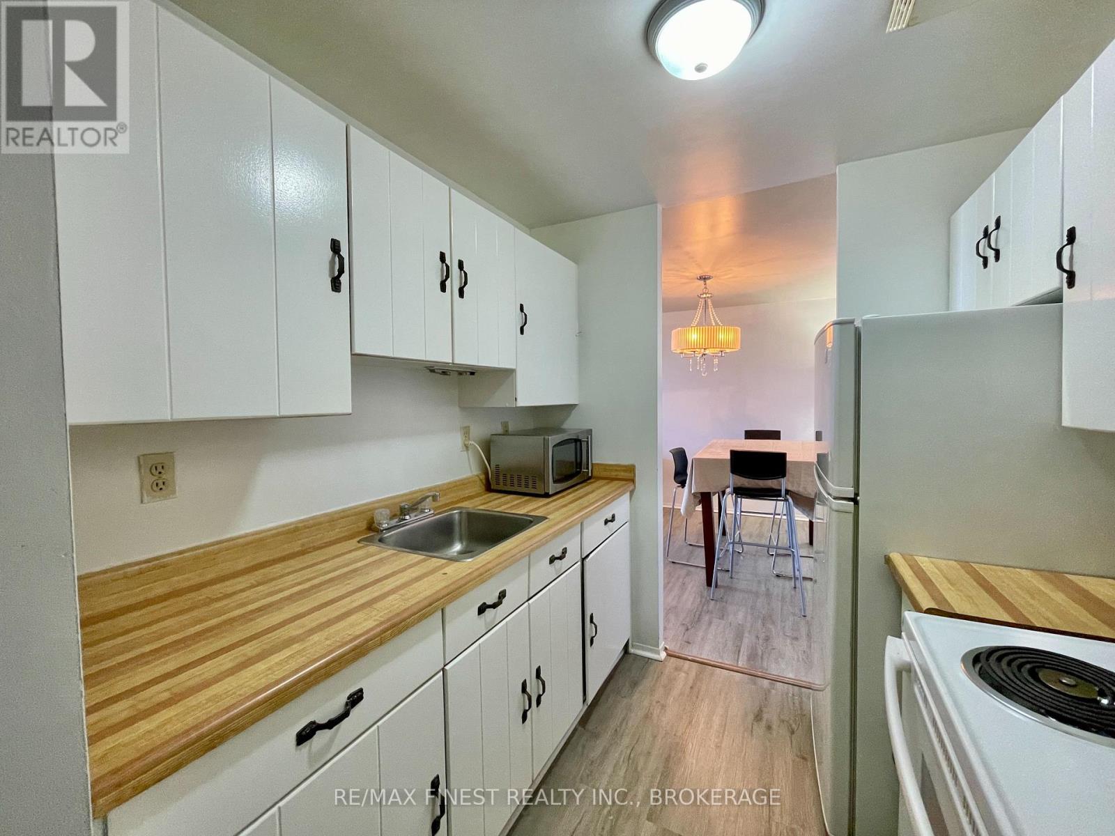 602 - 17 Eldon Hall Place, Kingston, Ontario  K7M 7H5 - Photo 4 - X12059123