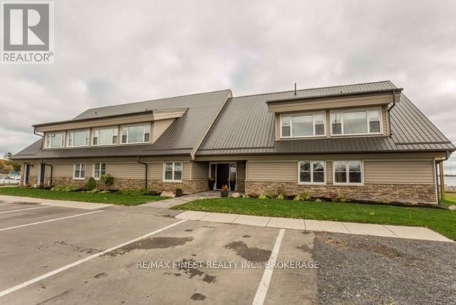 203 - 110 Bayshore Drive, Loyalist, Ontario  K0H 1G0 - Photo 3 - X12094054