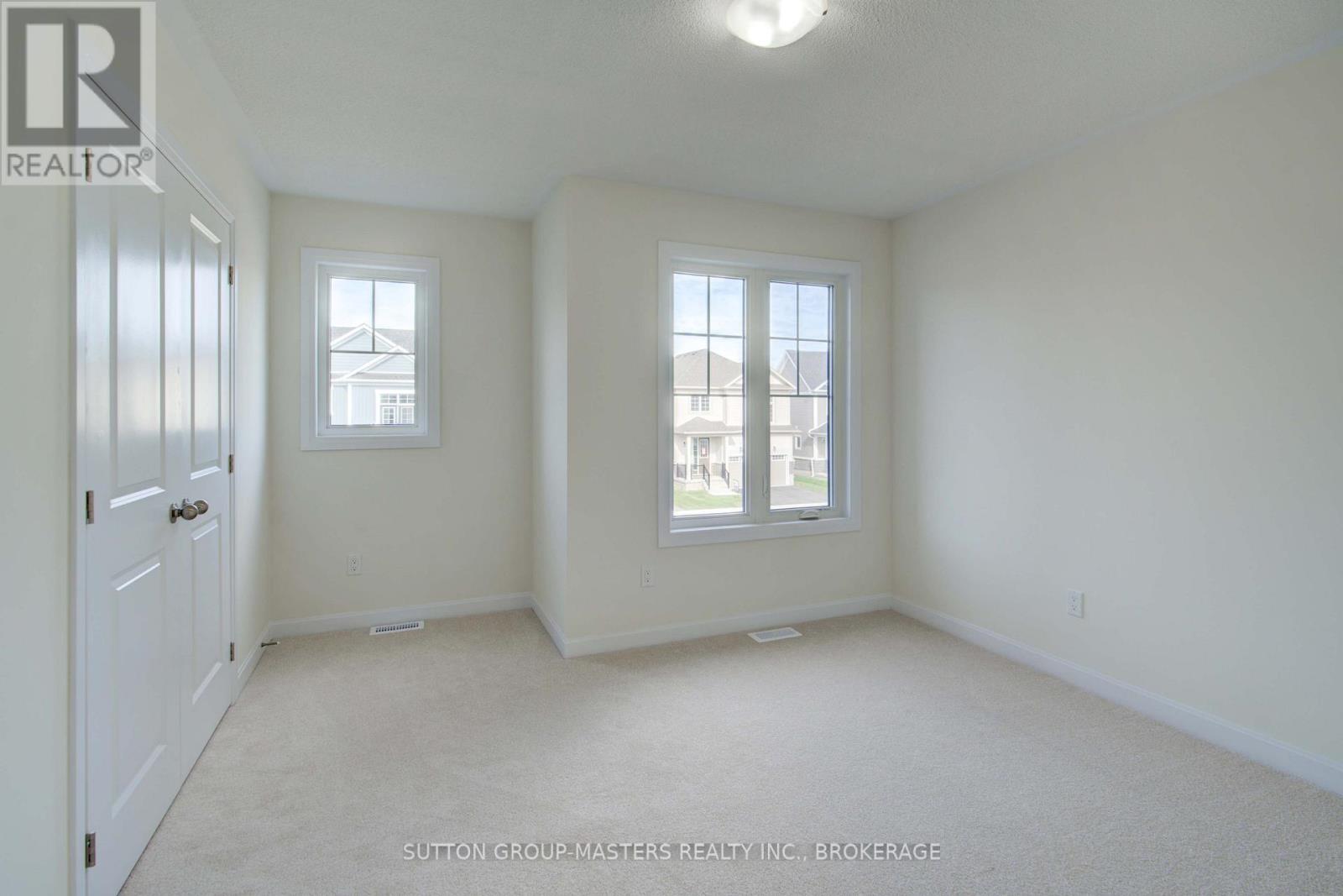 54 Golf Links Drive, Loyalist, Ontario  K0H 1G0 - Photo 28 - X12150114
