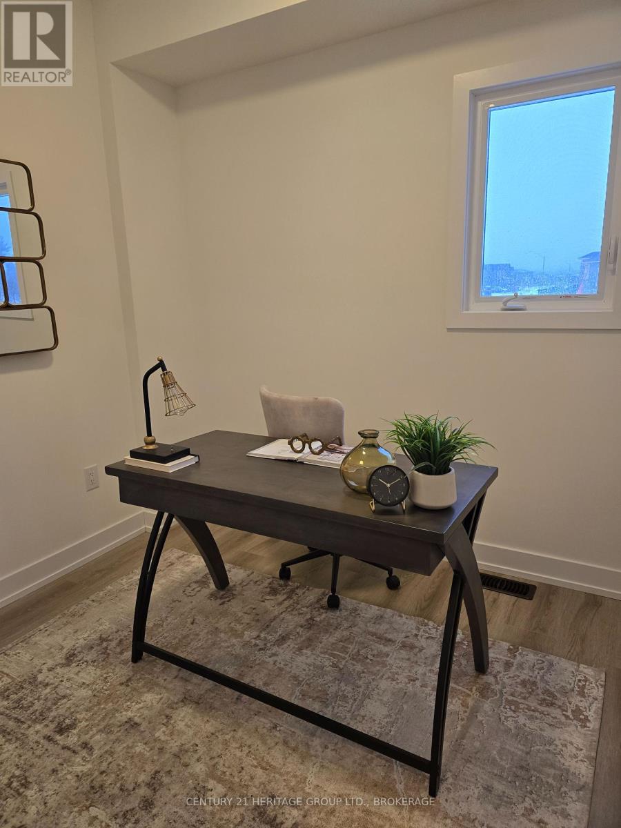 58 Dusenbury Drive, Loyalist, Ontario K0K 2H0 - Photo 10 - X12263382