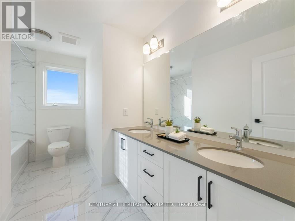 58 Dusenbury Drive, Loyalist, Ontario K0K 2H0 - Photo 18 - X12263382