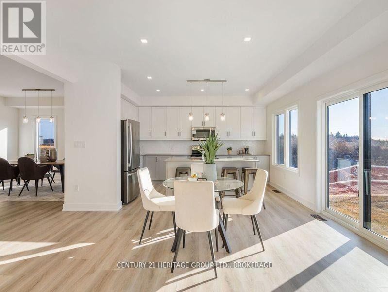 58 Dusenbury Drive, Loyalist, Ontario K0K 2H0 - Photo 7 - X12263382