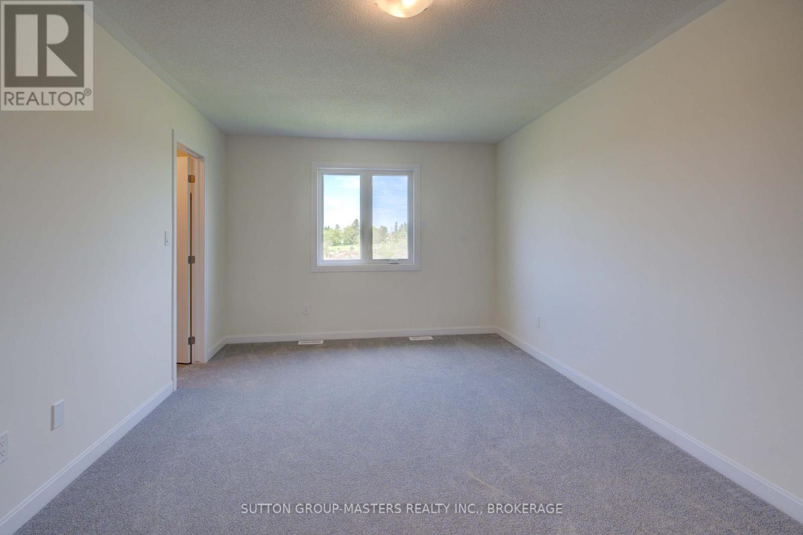 102 Oakmont Drive, Loyalist, Ontario  K0H 1G0 - Photo 24 - X12276358