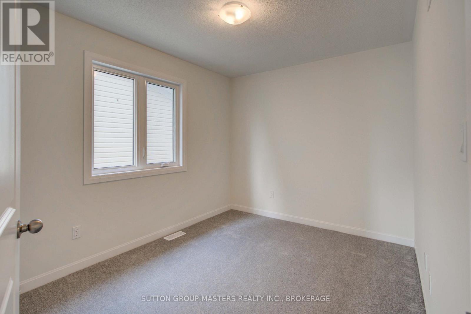 102 Oakmont Drive, Loyalist, Ontario  K0H 1G0 - Photo 32 - X12276358