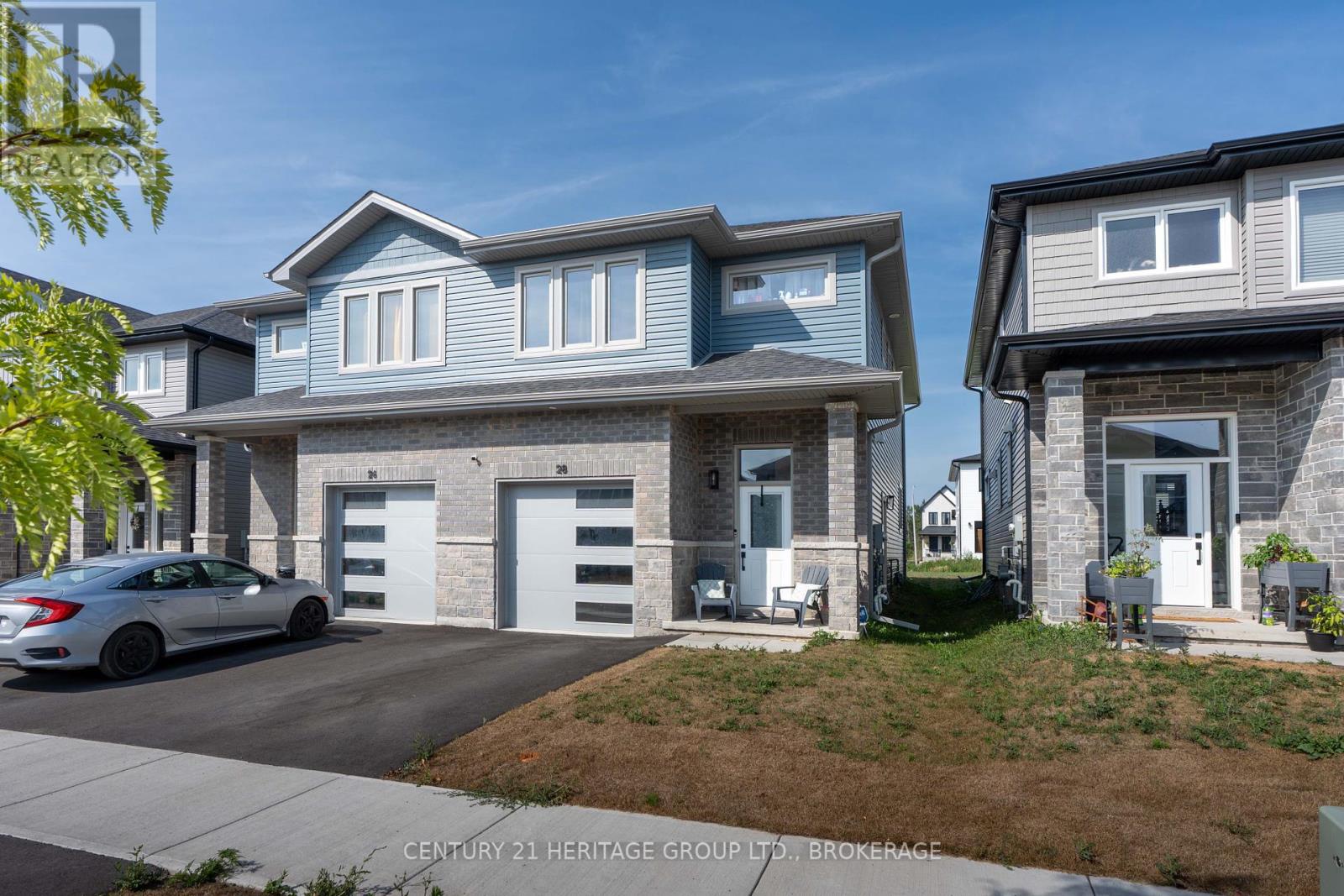 28 Dusenbury Drive, Loyalist, Ontario K0H 2H0 - Photo 2 - X12308183