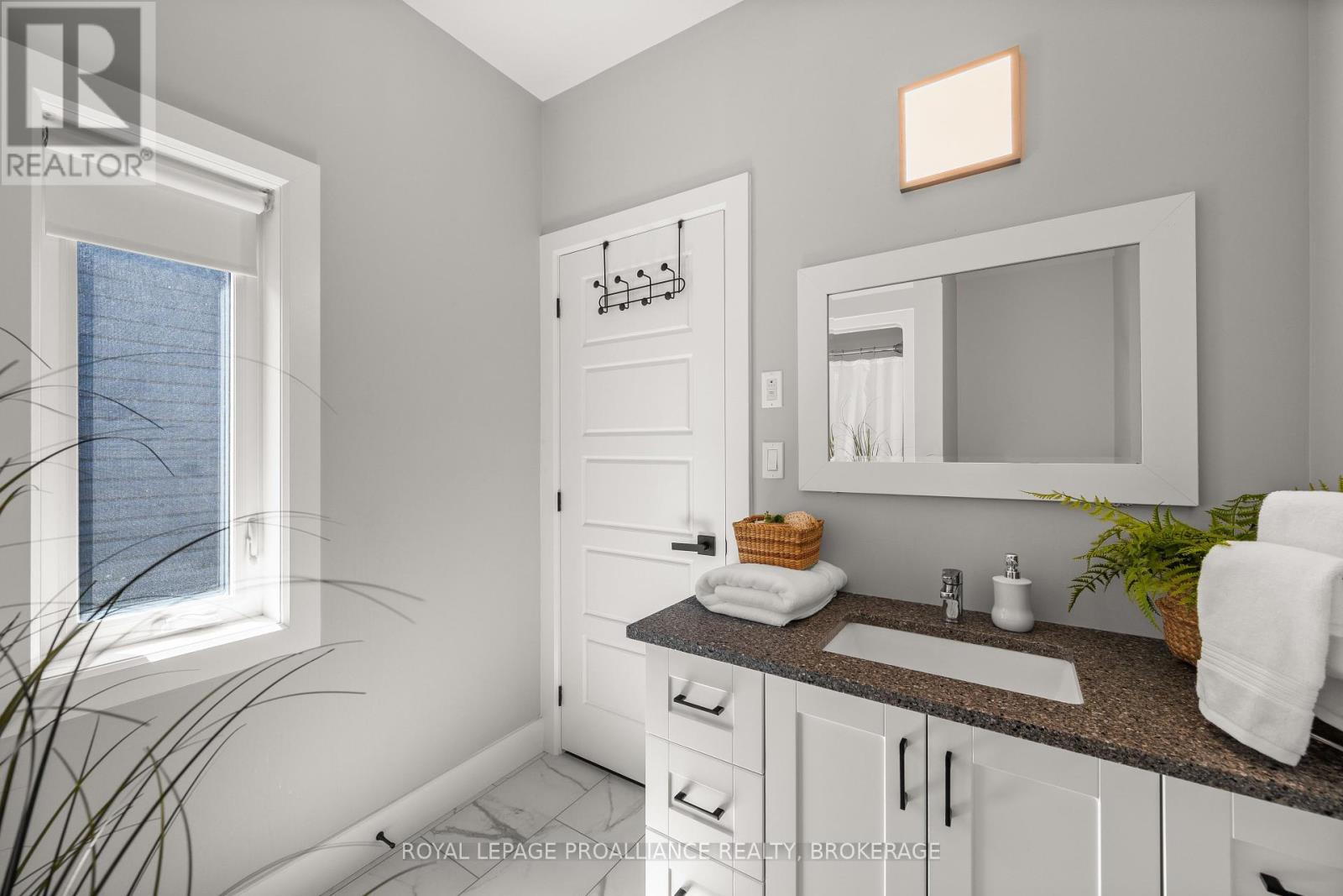 60 Potter Drive, Loyalist, Ontario K0H 2H0 - Photo 19 - X12383077