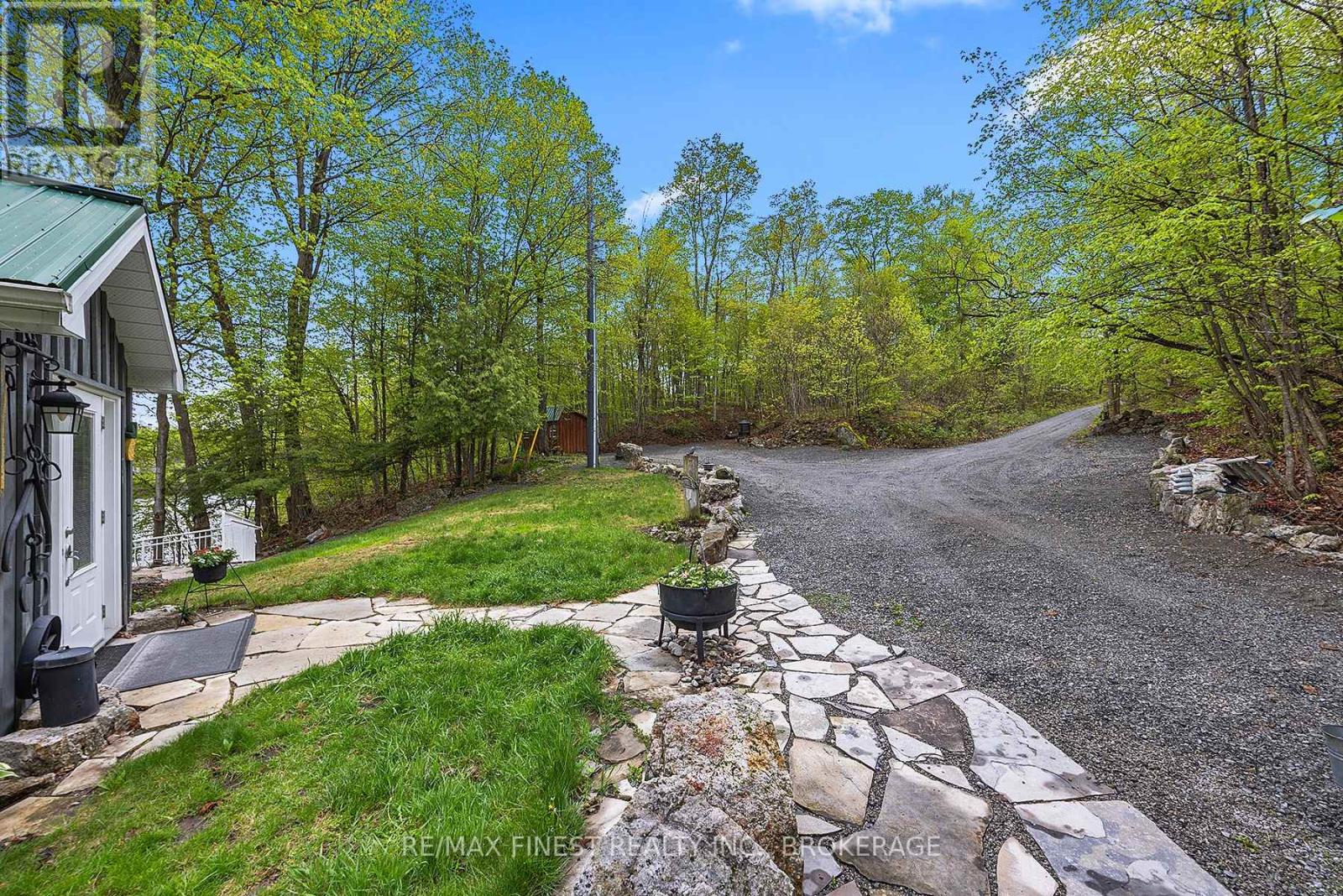 8126 Perth Road, South Frontenac, Ontario K0H 2L0 - Photo 6 - X12443582