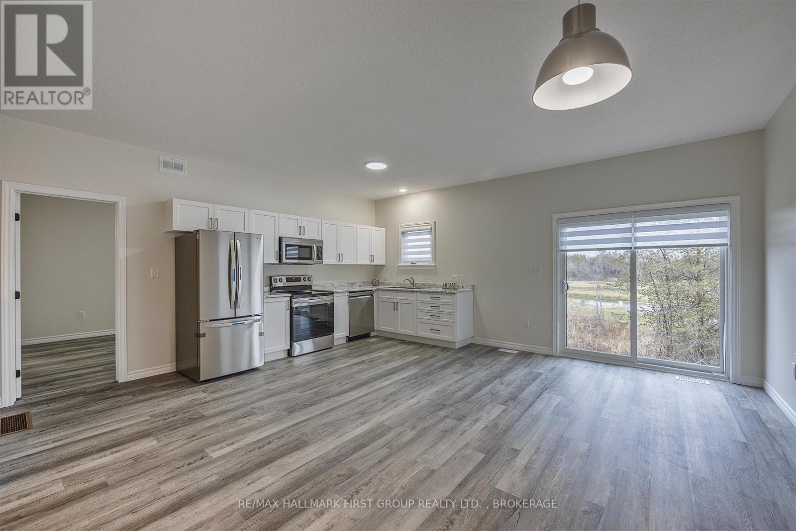 201 Creighton Drive, Loyalist, Ontario  K0H 2H0 - Photo 4 - X12802674