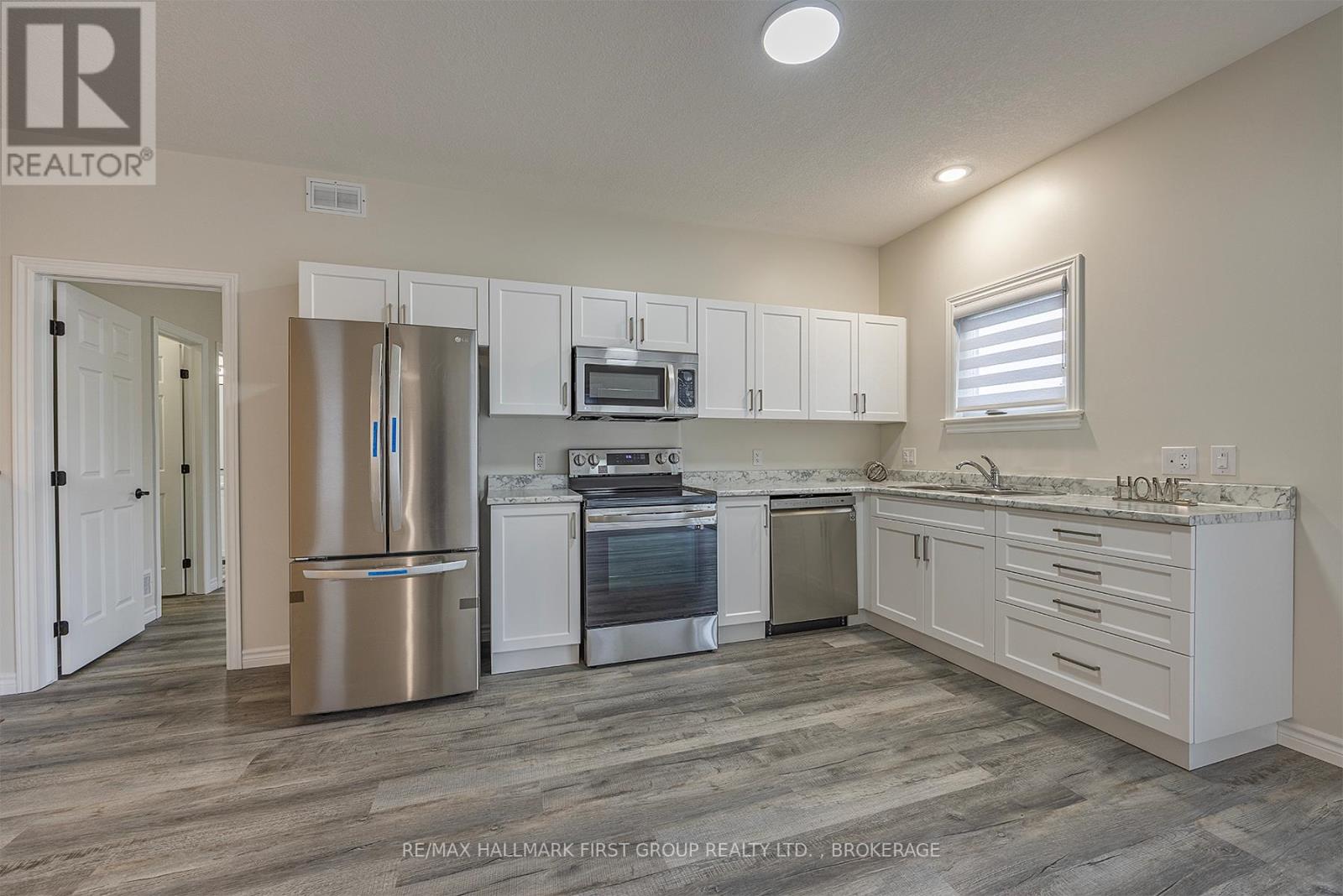 201 Creighton Drive, Loyalist, Ontario  K0H 2H0 - Photo 5 - X12802674